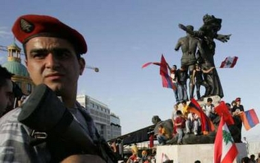 arc_A_policeman_stands_guard_as_Lebanese_Armenian_demonstrato.jpg